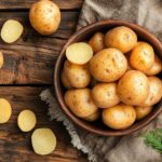 Yukon Gold Potatoes: Best Cooking Tips, Storage & Uses 8 Yukon Gold Potatoes on rustic table